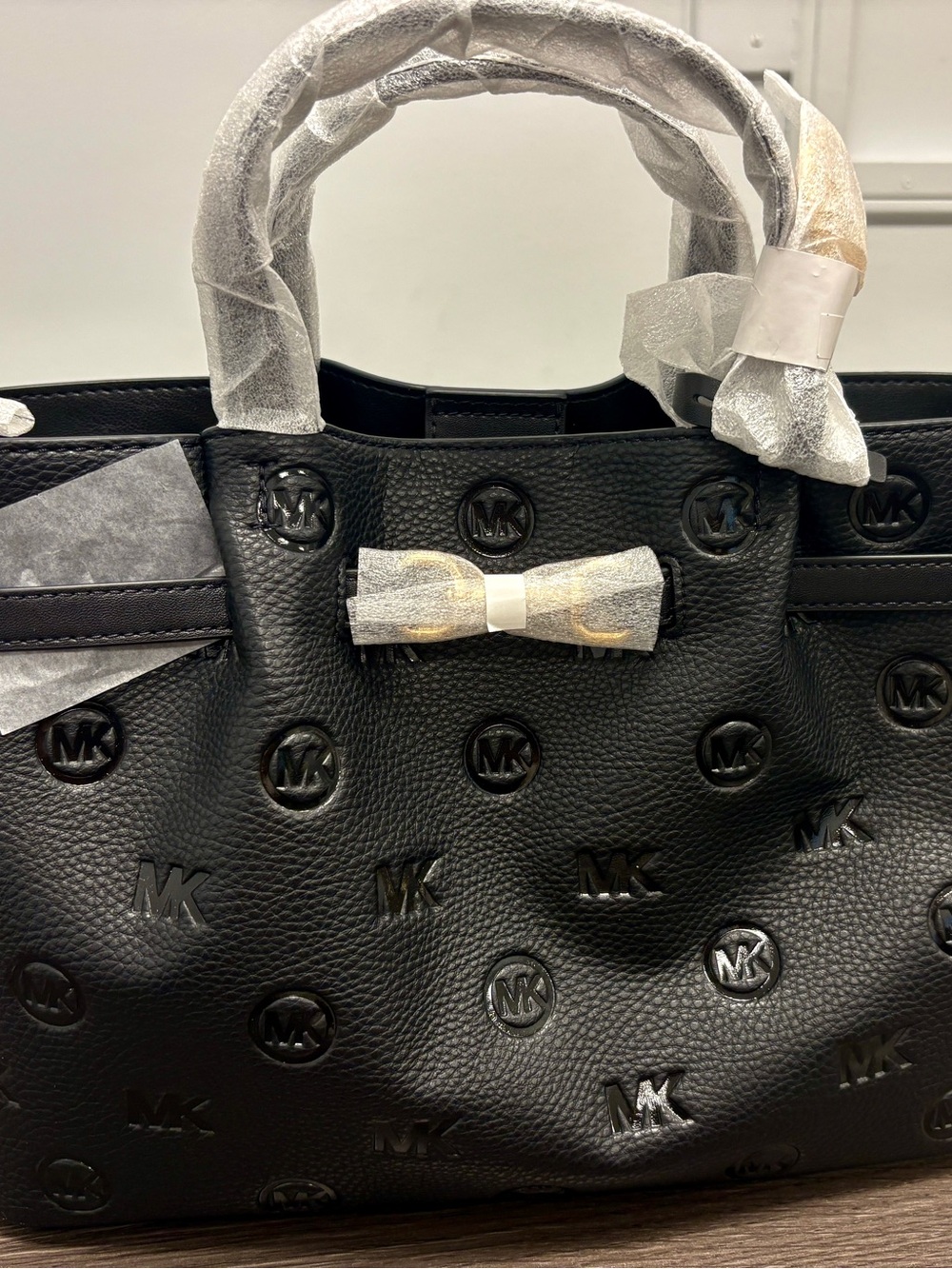 Michael Kors Carson Medium Debossed Satchel.